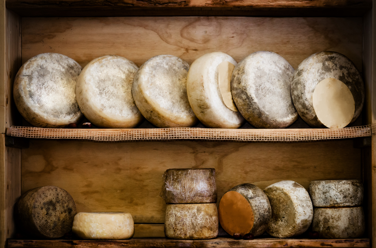 italian hard cheese on a market stall