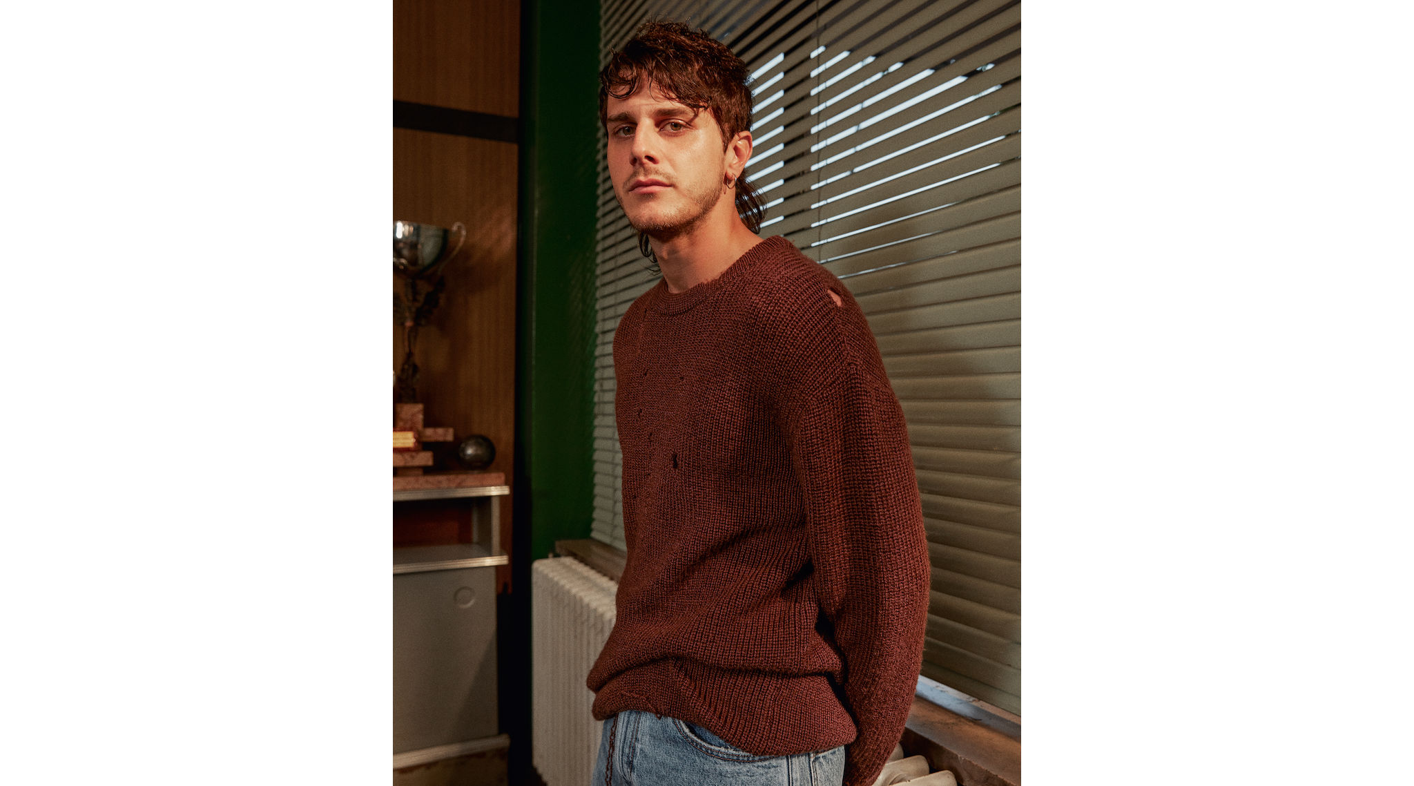 Maglia e jeans Gucci.