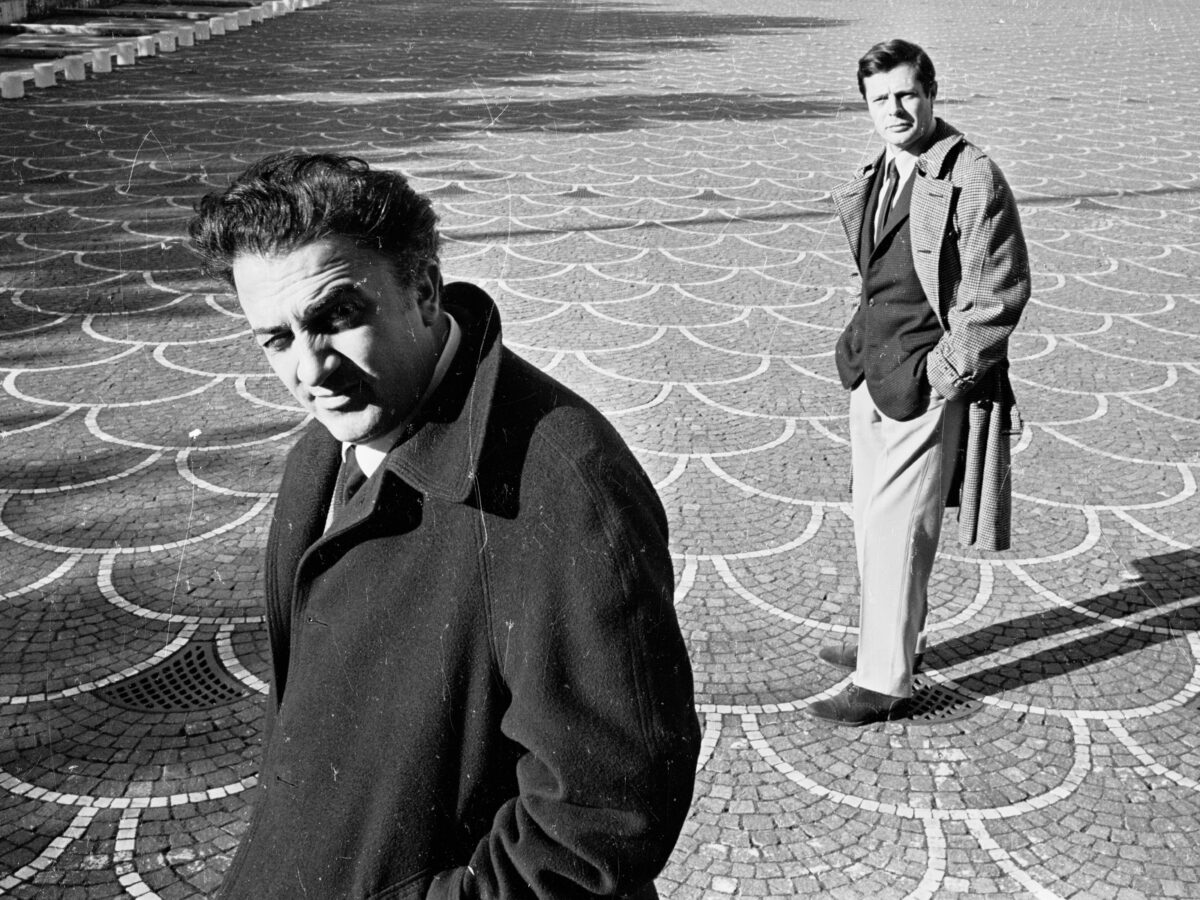 Film director Federico Fellini with actor Marcello Mastroianni in EUR Rome, 1962