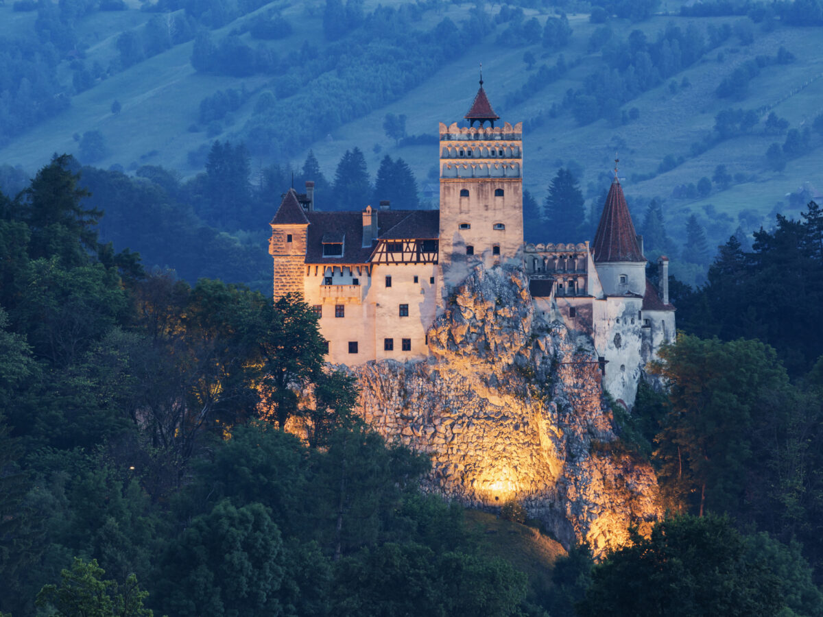 Illuminated castle on hill, Bran, Transylvania, Romania